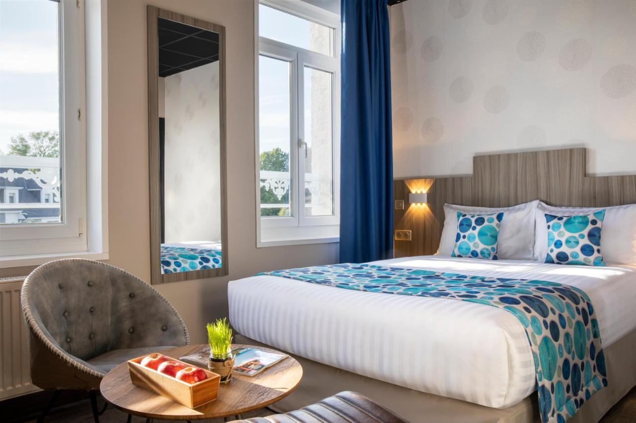 Cocoon Inn 쿠크 객실 사진