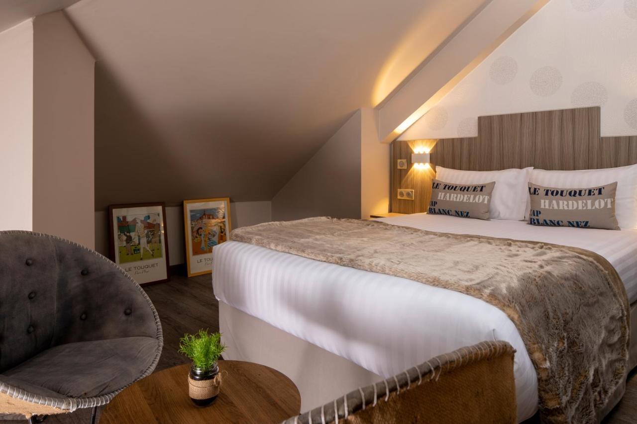 Cocoon Inn 쿠크 객실 사진